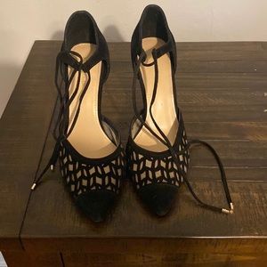 Black suede pointed toe heels